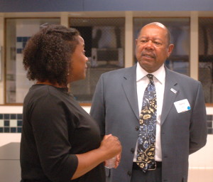 Chaya Scott (left), who heads the Coatesville Youth Initiative, chats with Harry Lewis, board president of the Brandywine Health Foundation, at the first Vision Cafe.