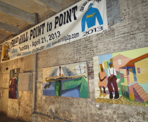 Paintings by Coatesville artist Dane Tilghman and steeplechase banners helped transform an aging city warehouse into an industrial chic venue for the Delaware Valley Point-to-Point Association's annual awards party.