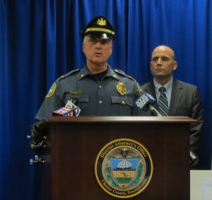 Coatesville Police Chief Jack Laufer (left) joins Chester County District Attorney Tom Hogan at a news conference announcing the arrest of Gerald D. Pawling, a former city detective.