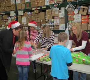 An assembly line of volunteers helped make the wrapping portion of the program go smoothly.