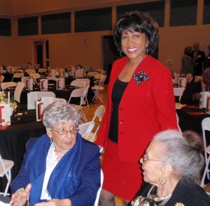 Diana Robinson Lewis checks in with her mother, Doris Spann (right), and her aunt, before the program.