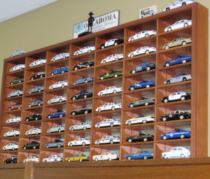 Coatesville Police Chief Jack Laufer combined his interests in state-police history and wood-working to create a home for a collection that includes a model for the state police vehicles in all 50 states.