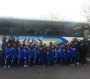 Members of the "Soccer for Success" program get ready to board the bus for a trip to visit the White House.