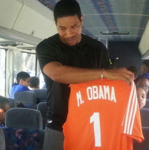 J.T. Dorsey shows off the jersey the group left at the White House for First Lady Michelle Obama.