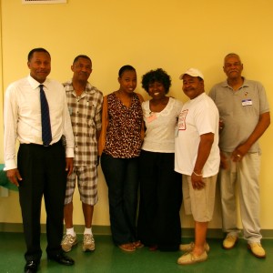 (Left to right) BOYS Program Coordinator Francis Washington stands with mentor John Robinson, G3 Program Coordinator Kendra Wilson, and mentors Cassandra Burgess, James Hills, and Harvel Brown. "We work equally together to make it all happen," said Burgess.