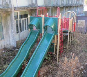 This unused playground equipment behind the Gordon Education Center is about to be rescued and relocated at Ash Park so it can be used by city children.
