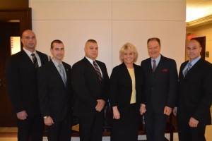 Kevin Leary (from left), a new deputy sheriff, is joined by new Deputy Sheriff Michael Clark, new Deputy Sheriff Benjamin Tobin, Sheriff Carolyn “Bunny” Welsh, Chief Deputy Sheriff George March, and new Deputy Sheriff Andrew Kline during Monday’s swearing-in ceremonies.
