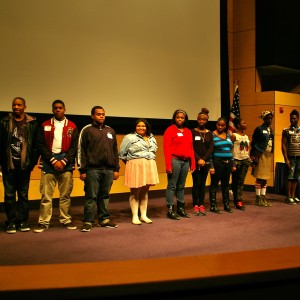 Bridge Academy students receive a standing ovation from the 150 attendees.