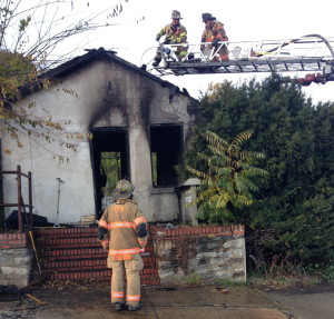 Firefighters work to extinguish a blaze that struck an abandoned building on West Lincoln Highway in Coatesville on Saturday afternoon.