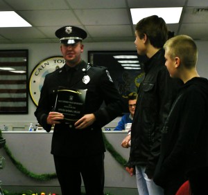 Officer Nate Miller receives Officer of the Year honors as his family looks on.