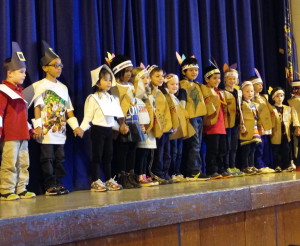 Kindergarten students from Caln Elementary take the stage as Pilgrims and Indians.