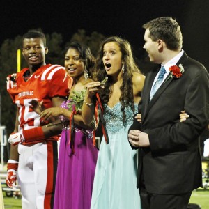 Shannon McGlaughlin (inside right) learns of her election as homecoming queen. Right to left: Jay Stocker, Darrien Allen,  Shannon McGlaughlin, Kyle Starcheski
