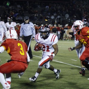 Jalen Hudson takes a handoff to the second level. Coatesville depended on Hudson to run the game out.