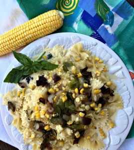 Enjoy corn pureed and used as a sauce over pasta dressed with fresh summer vegetables.