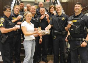 Lauren Bolt, executive pastry chef at Jenner’s Pond Retirement Community, delivers freshly baked cookies to members of the Chester County Sheriff’s Department.  